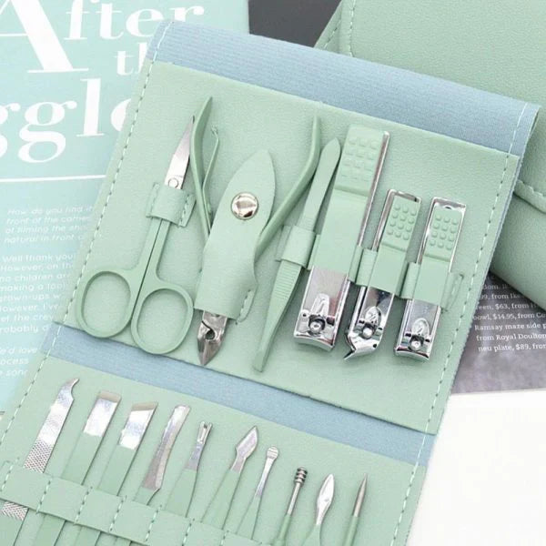 Mint green manicure and pedicure tool set in a matching travel case, featuring stainless steel nail clippers, cuticle tools, tweezers, scissors, and nail files for complete nail care and grooming.