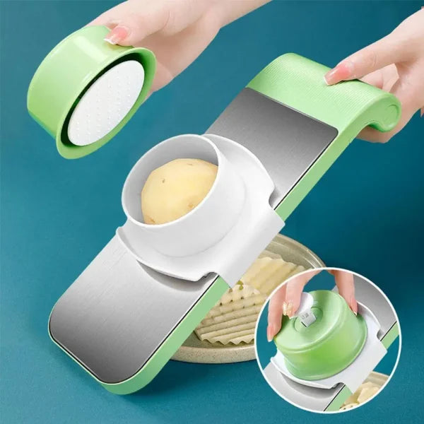 Green and silver potato peeler displayed with a bowl of freshly peeled potatoes on a blue background. Showcases a practical kitchen tool for quick and easy vegetable peeling, helping save time during food preparation and cooking.