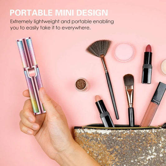 Hand holding a selection of makeup products including brushes, lipsticks, and a compact against a pink background, showcasing beauty essentials for everyday makeup application and cosmetic routines.
