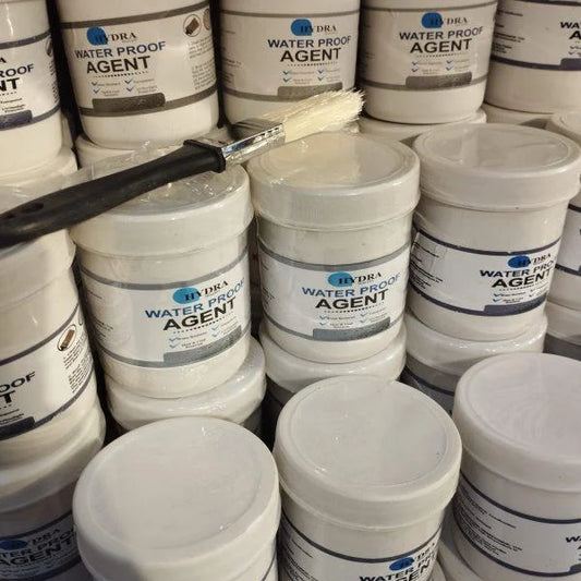 Containers of waterproof leakage repair agent with a brush applying the protective coating, designed to seal cracks, prevent water damage, and provide long-lasting waterproof protection.